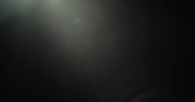 A pack of two optical lens flare effect on black background. Abstract overlays in slow motion. 