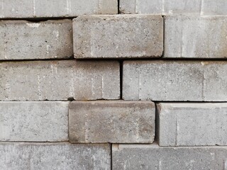 Stones and rocks. An old crumbling wall with a beautiful, rough structure. 