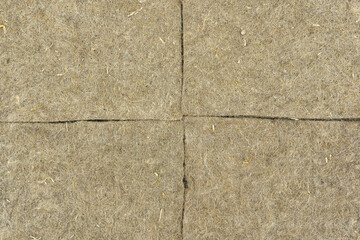 Background from pieces of coconut coir for growing microgreens. Dry coconut fiber, texture.