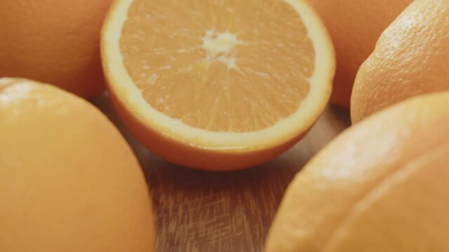 Dolly shot of a fresh slice of orange