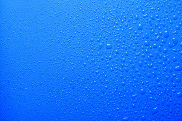 Water drops on blue color  surface