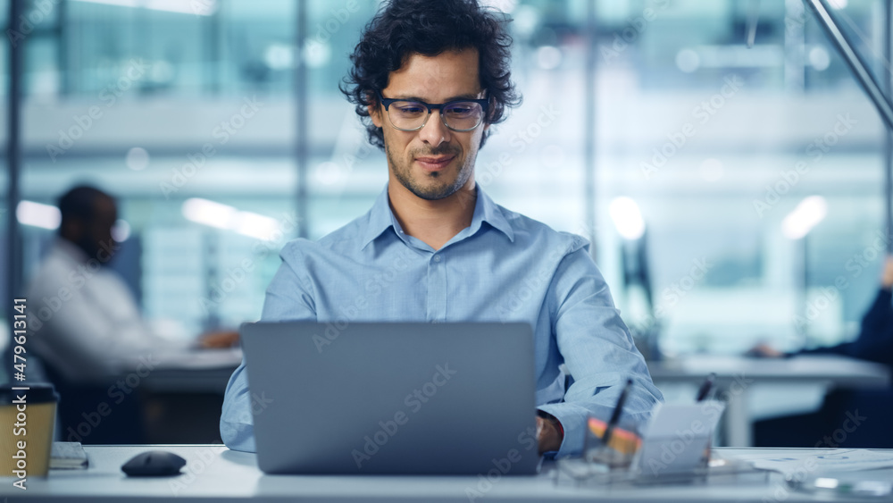Poster modern office businessman working on computer. portrait of successful latin it software engineer wor