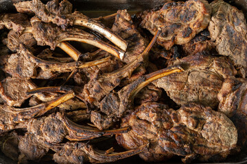 Grilled Foods - Rack of Lamb, grilled on a baking sheet. Blanks for restaurant and catering.