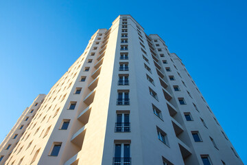 Facade of a new multi-story residential building. architecture and modern construction
