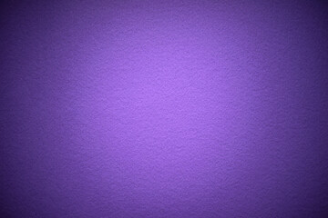 Purple felt fabric background. The texture of a soft purple carpet