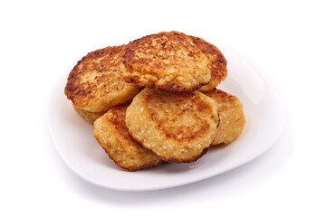 Freshly baked cottage cheese pancakes, isolated on white background.
