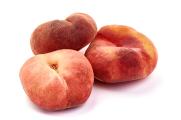 Flat Peaches, ripe nectarines, isolated on white background.