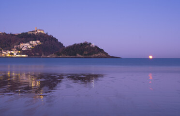 Moonset on La Concha beach, city of Donostia-San Sebastian, Euskadi