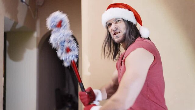 Angry Santa Claus with a baseball bat