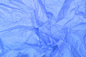 Obraz premium Bright violet crumpled paper texture, violet background, wallpaper. Close up paper texture. Grunge violet paper material. Background for design and for text. 
