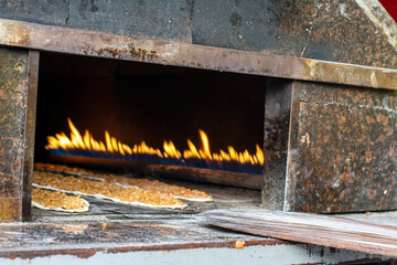 Fototapeta na wymiar burning firewood in the fireplace