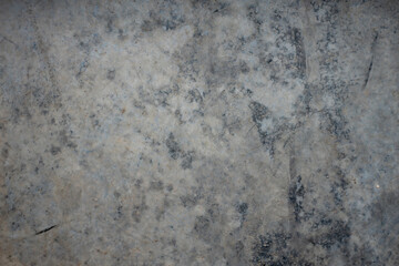 Fototapeta premium A concrete wall with dust of dirty gray color