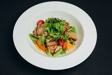 The professional chef made a delicious dish for the visitor.