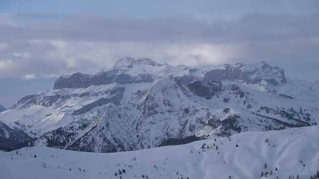 mountain peak, very high snowy peak in dolomite mountain winter with copy space, snowy dolomites in italy