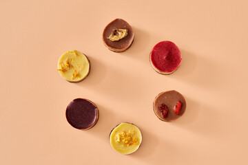 Healthy raw vegan fruit mini cheesecakes, top view