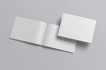 Poster De landschapssjabloon van een open boek, met omgeslagen pagina& 39 s, met realistische schaduwen, voor de presentatie van ontwerp. © Graphicdeal