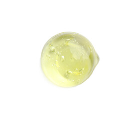 Drop of yellow ointment on white background, top view