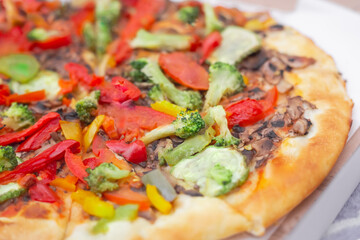 Vegan pizza close up. Healthy homemade snack for student party.	