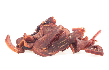 Portion of pork jerky isolated on a white background. Pieces of dry meat.
