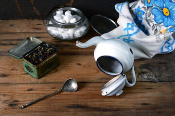 Fototapeta premium vintage teaware and towel on wooden table