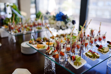 buffet at the event on the mirror table, catering