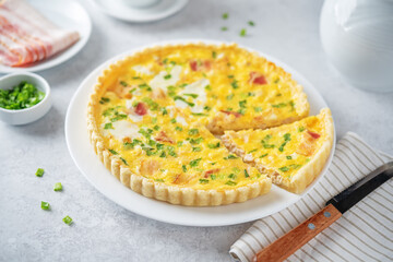 Chicken bacon quiche with scallions in a plate