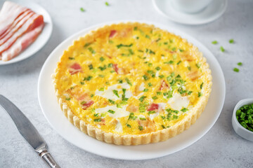 Chicken bacon quiche with scallions in a plate