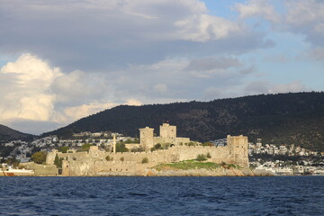 Fototapeta na wymiar Bodrum Castle view from beach. Bodrum is populer tourist destination in Turkey.