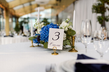 wedding table decoration with number 3 and flowers