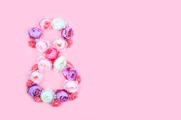 Fototapeta na wymiar Floral number eight with butterflies on pink background.Concept for Valentine's Day or Women's Day, Mother's Day, banner, congratulations to your beloved on the holiday, birthday,