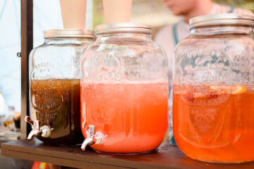 large bottles of lemonade on the buffet