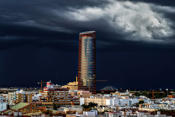 Historic Triana Neighborhood and Seville city skyline at dusk. Seville city, Tradition and Modernity © Shootdiem