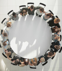 top view. a group of young people pointing at the camera