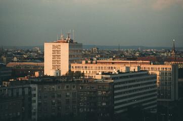 Analog photo of a city in sunset