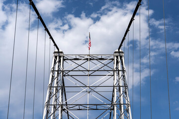 US flag on top of the Royal Gorge Bridge in Colorado