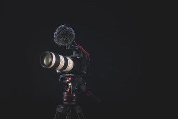 Professional camera gear for cinematography and filmmaking ready to shoot with clean background for text