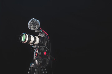 Professional camera gear for cinematography and filmmaking ready to shoot with clean background for text