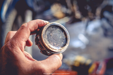 Damaged motorcycle engine piston rings from use.
