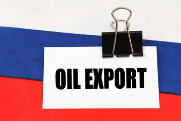 On the flag of Russia there is a business card with the inscription - Oil export