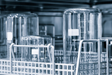 The glass bulb, Chemical or pharmaceuticals flask in the washing machine. Chemical vessels. Glassware, Washing, cleaning and sterilization