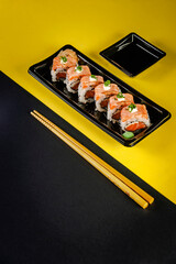 Uramaki blowtorcherd salmon.
