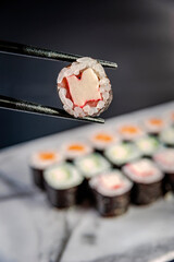 Kanimaki on chopsticks.