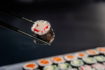 Kanimaki on chopsticks.