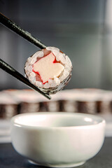 Kanimaki on chopsticks.