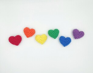 Rainbow colored crochet hearts, lgbt community flag, pride concept