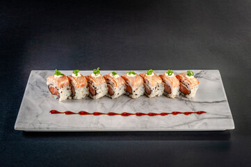 Uramaki blowtorcherd salmon.