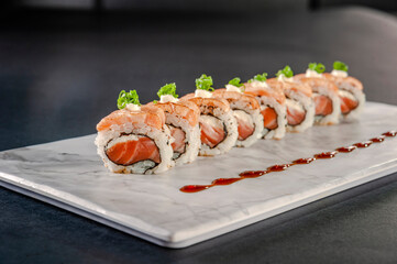 Uramaki blowtorcherd salmon.