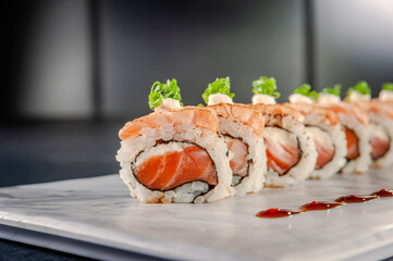 Uramaki blowtorcherd salmon.