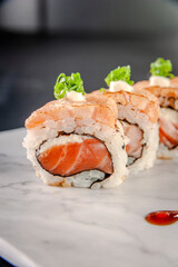 Uramaki blowtorcherd salmon.