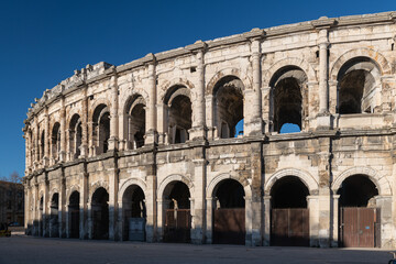 Fototapeta na wymiar View of the famous Roman Coliseum - Nimes, France 